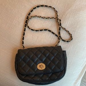 Black quilted handbag